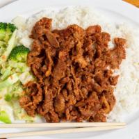 Spicy Pork · Sliced pork and pan cook with our special hot sauce over steamed.