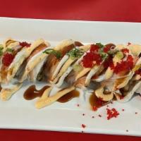 White Tiger Roll · spicy tuna, and cucumber topped with super white tuna, kani stick, tobiko, and green onion