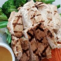 Lemongrass Chicken · Steamed vegetable, Grilled lemongrass chicken topped with peanut sauce.