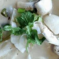 Tom Kha Soup · Galangal, lemongrass, kaffir leaves, mushroom, cabbage, lime juice, and coconut milk.