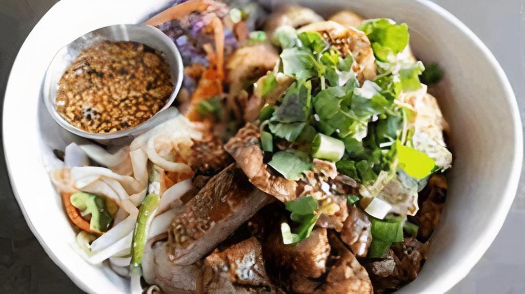 Vietnamese Vermicelli Noodle Bowl · Crispy Imperial Roll, Grilled Pork, Lettuce, Peanuts, Bean. Sprouts, & Fresh Herbs