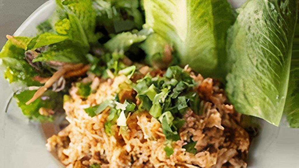 Khao Nam Tod · crispy rice salad: made with fried marinated rice,. ground thai sausage, shallots, ginger, & fresh herbs -. served with lettuce to wrap