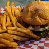 Mushroom Burger With Provolone Cheese · 1/3 pound angus beef chuck. served on a grilled bun lettuce tomatoes pickles onions and sauce.