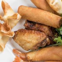 Appetizer Sampler · Two each. Shrimp rolls, crab rangoon, potstickers, wings, egg rolls.