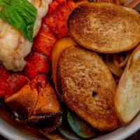 Marco Polo Sette Mare · Lobster, shrimp, scallops, clams, mussels, squid, and fish sautéed in garlic and white wine,...