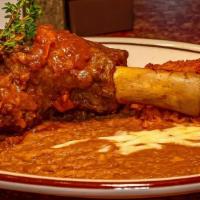 Lamb Shank Frank Sinatra · Lamb shank braised in Kenwood Jack London wine with saffron risotto and roasted rainbow baby...