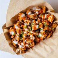Popcorn Chicken · Our popcorn chicken is made with thigh meat and we bring it like all our chicken. What does ...