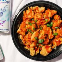 Chicken Rice Bowl · Popcorn chicken on top of a layer of rice, Korean sauce, mayo and cheese.