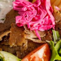 Beef Gyro Plate · Beef Gyro served with rice, salad, hummus and pita bread.