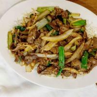 Mongolian Beef · Hot. Beef filets sautéed with scallions and ginger in a savory seasoned sauce with hot peppe...