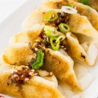 Pot Stickers (5Pc) · Thin wrapper potstickers with a crispy bottom and pork fillings