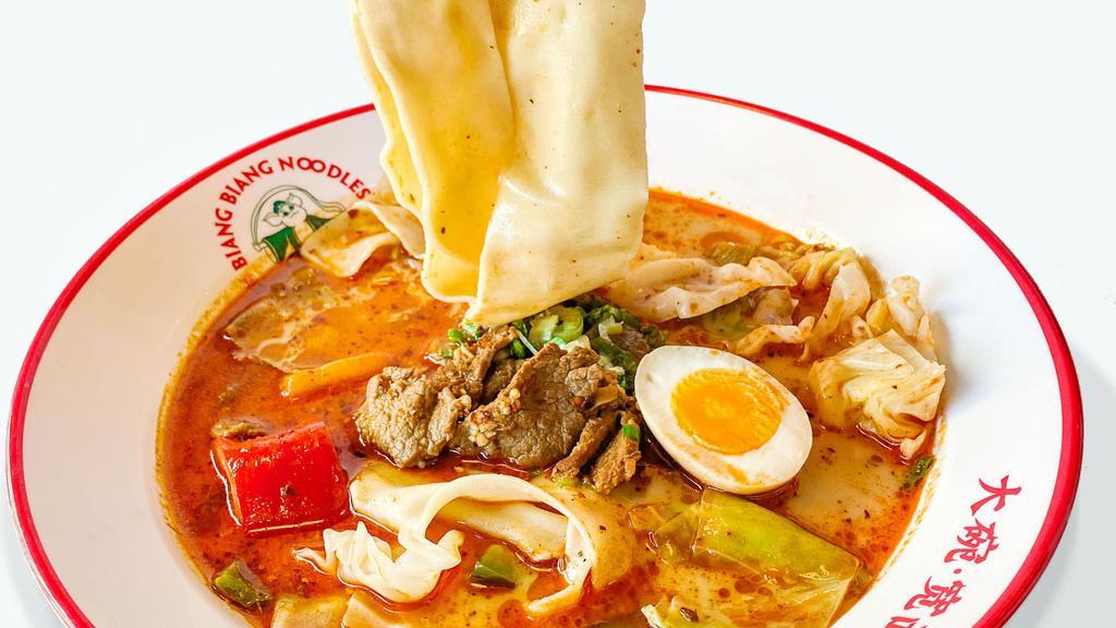 Mala Spicy Beef Soup Noodles · Spicy & tingly beef on top of hand-pulled noodles with pork bone broth