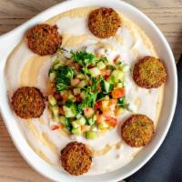 Falafel Platter · Falafel balls, hummus, Israeli salad, tahini sauce and pita.