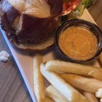 Sliders · Two pieces grass-fed beef burger, lettuce, tomatoes, and 18 zesty sauce. Served with fries.