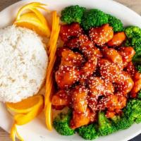 Orange Chicken · While meat chicken battered and deep fried. Cooked in a wok in our special orange zest sauce.