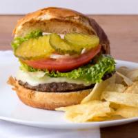 Classic Cheeseburger · All-natural 6oz beef patty, American cheese, grilled onions, lettuce, tomatoes and brioche b...
