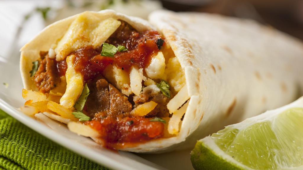 3 Way Mix Chorizo Burrito · Delectable burrito full of red chile with chorizo, green chile, and refried bean burrito.