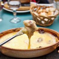 Queso Fundido · Delicious melted cheese dip.