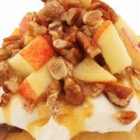 Caramel Apple Pie Roll · Caramel frosting topped with fresh apples, pecans, homemade pie crumble and caramel sauce
