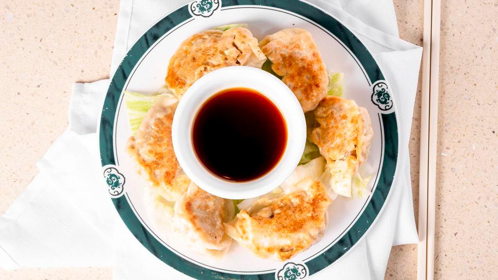 Pot Sticker (6 Pcs) · Pan fried Chinese dumpling with groud pork and veg. This item is very popular in mainland China.