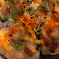 Mountain Roll · In:Krab, Avocado, Cucumber
Top: Baked Salmon, Spicy Tuna