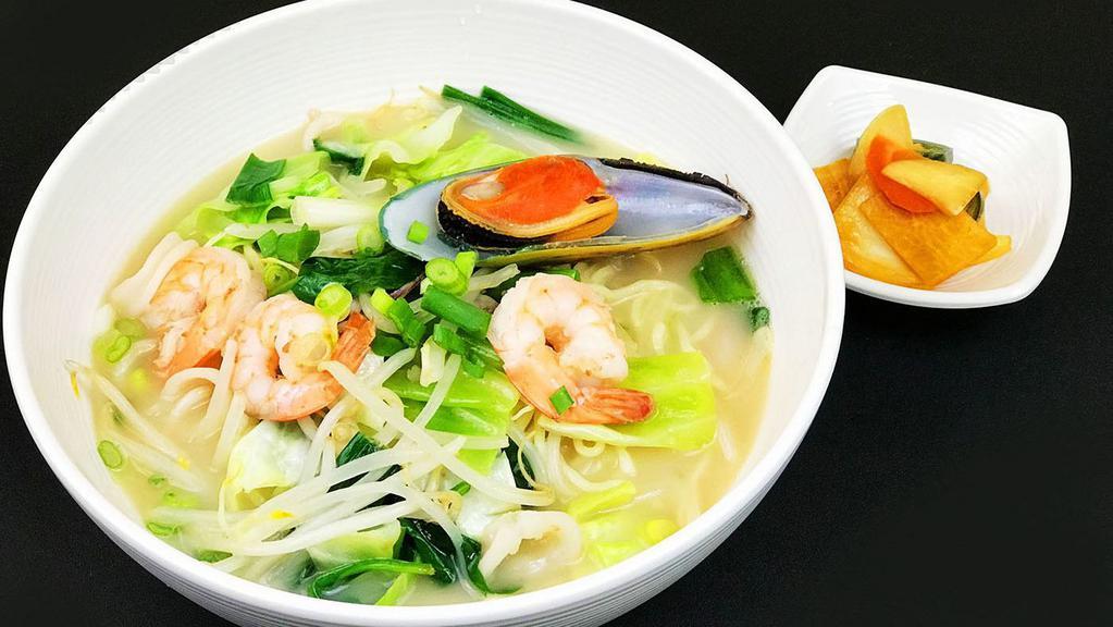 Nagasaki Seafood Ramen · Our specialty item - refreshing beef bone broth with pork sauce and loads of shrimp, calamari, and mussel.