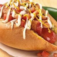 Sonora Hotdog · Wrapped in bacon with grilled onions, pinto beans, tomatoes, guacamole ketchup, mustard, may...
