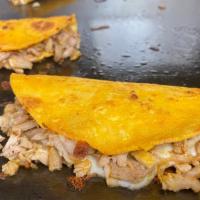 Quesa Chicken · Crispy taco with cheese, onion and cilantro