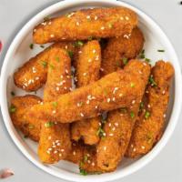 Sesame Chicken Strips · Chicken tenders breaded and fried until golden brown. Served with your choice of dipping sau...