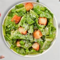 Caesar Salad · Romaine lettuce, croutons, lemon, and parmesan tossed with caesar dressing.
