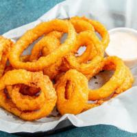 Onion Rings · Extra crispy onion rings with a side of our homemade zesty ranch.