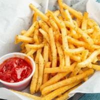 Seasoned Fries · French fries with our mmmPRESSED seasoning.  Served with ketchup.