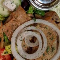 Gyro Salad · Chicken or beef-lamb gyro slices, chopped romaine lettuce, tomatoes, kalamata olives, Feta c...