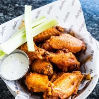 Buffalo Chicken Wings · Celery sticks and blue cheese.