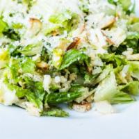 Chipotle Caesar Salad · Romaine hearts, chipotle dressing, crispy tortillas, pumpkin seeds