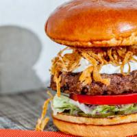 Our Famous Blue Cheese Burger · With fried onions.
