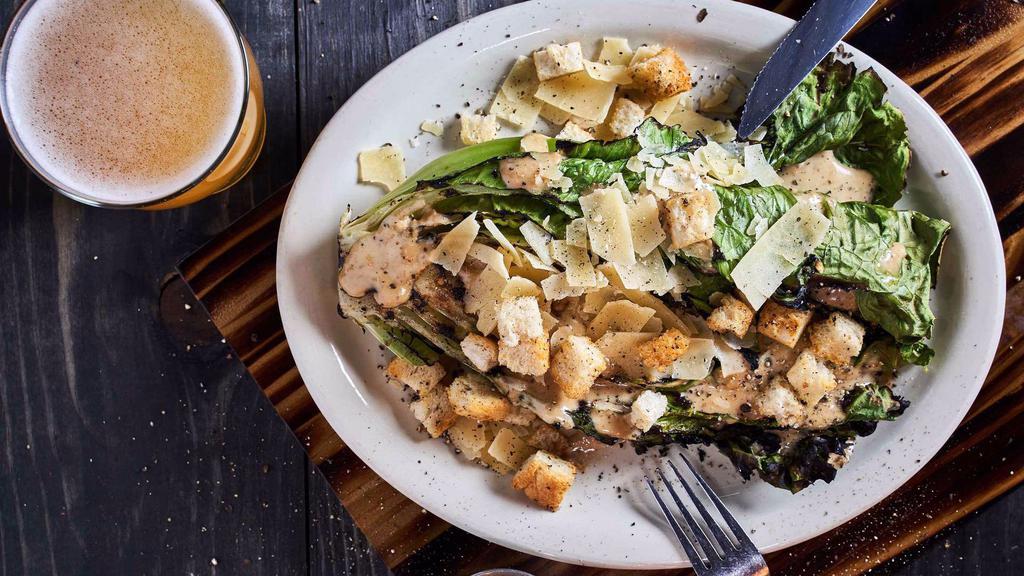 Grilled Romaine Salad · Popular. Shaved parmesan, lemon-anchovy dressing, garlic croutons.