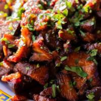 Char Siu · Chinese BBQ pork shoulder, cooked 17 hours in a spicy sweet fermented red bean curd sauce. S...
