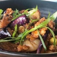 Sichuan Eggplant And Pork · Savory and spicy minced pork & eggplant wok fried in garlic, ginger, scallion, Thai chilis a...