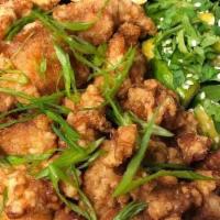 Kids Sweet & Sour Chicken · Crispy chicken bites tossed in house made sweet and sour sauce. Served with steamed broccoli...