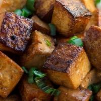 Kids' Sweet & Sour Tofu · Crispy tofu bites tossed in house made sweet & sour sauce. Served with steamed broccoli over...