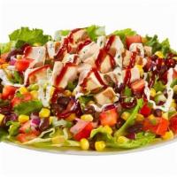 Buffalo Chicken (160 Ounces) · Romaine,
Spring Mix,
Chicken,
Red Onion,
Tomatoes,
Cucumbers,
Feta Cheese,
Buffalo Dressing,...