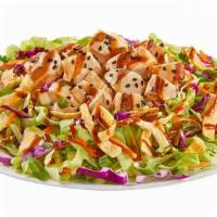 Asian Chicken · Chicken,
Lettuce,
Carrots & Cabbage,
Cilantro & Green Onion,
Sesame Seeds,
Wontons,
Asian Dr...