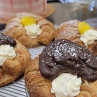 Kronut · Croissant filled with whipped cream and custard or fruit (lemon, raspberry, blueberry, straw...