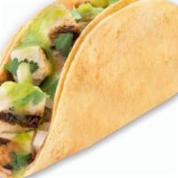 Baja Taco · Your choice of protein on corn tortillas with salsa, onions and cilantro.