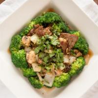 Pad Garlic & Pepper · Stir fried with choice of meat, ground garlic and pepper sauce with steamed broccoli, carrot...