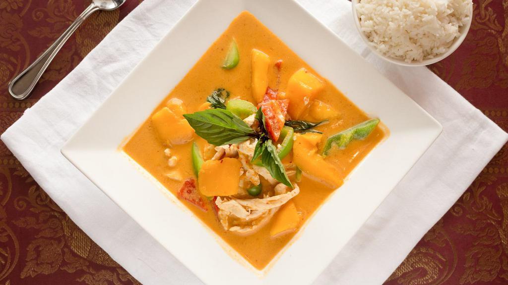 Mango Curry · Choice of chicken, or pork, or tofu with mango, bell peppers and basil leaves simmered in               red curry and coconut milk