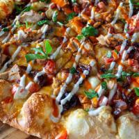 Personal Blazin Buffalo Pizza · Herbed Olive Oil Base. Oven-roasted chicken, minced garlic, caramelized onions, cheddar,. mo...