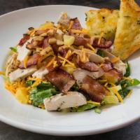 Entrée Chicken Bacon Pineapple · Fresh romaine, oven-roasted chicken breast, pineapple, caramelized onions, crushed cashews a...