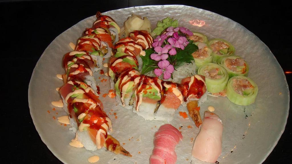 Valentine Roll · Tempura shrimp, crabmeat inside, top tuna, salmon, avocado, spicy mayo sauce, eel sauce, tobiko.

These items may be served raw or undercooked, or contain raw or undercooked ingredients; consuming raw or undercooked meats, poultry, seafood, shellfish, or eggs may increase your risk of foodborne illness.